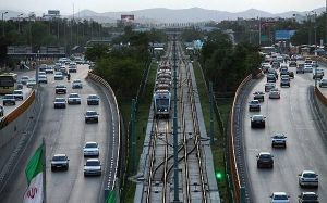 Mashhad Metro - passing mellat park station.jpeg
